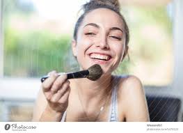 happy age applying makeup a