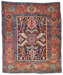 antique heriz rug with large leaves
