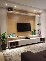 Another hanging tv idea that is a perfect inspiration for a minimalist home to avoid using more bulky furniture. Decorator Tricks For Small Living Rooms And More Homes Tre Tv Room Design Living Room Tv Wall Wall Tv Unit Design