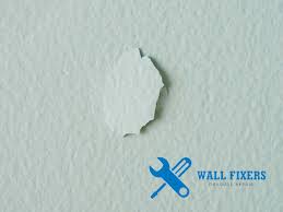 nail pops in your walls how to fix it