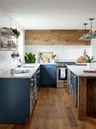 blue country kitchen with brown island