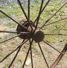 2 Antique Cast Iron Wagon Wheels
