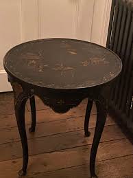 a anned black lacquer chinoiserie
