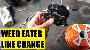 STIHL KM130R WEED WACKER STRING TRIMMER LINE REPLACEMENT - YouTube