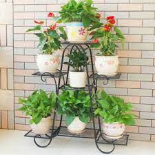 Made from sturdy acacia wood, this plant stand can be placed both inside and outside for a durable piece that will last throughout the elements and years. 7 Pots Thick Iron Plant Stand Planter Shelf Rack Garden Hotel Commercial Display Ebay