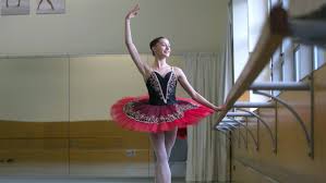 ballet dancers prepare to compete