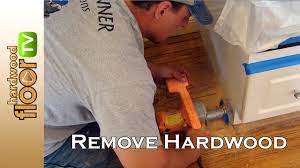 remove hardwood floors under cabinets