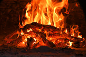 A Fire Is Burning In A Fireplace Free