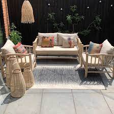 rustic wooden framed garden sofa and
