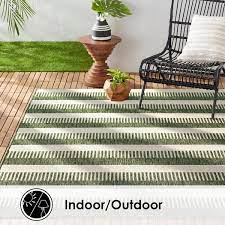 nicole miller new york patio country charlotte modern stripe indoor outdoor area rug light green ivory 5 2 x7 2