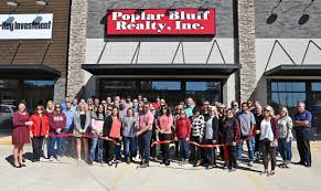 photo gallery pb realty opens new