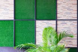 Wall Of Stone And Artificial Grass