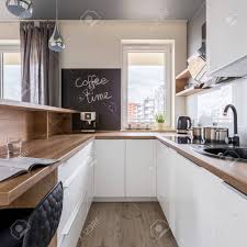 with wooden worktop, white furniture