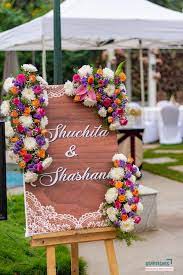 Trying to decorate your wedding in a budget? Wedding Entrance Board Ideas Desi Wedding Decor Wedding Stage Decorations Wedding Table Decorations Diy