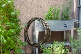 A Drinking Water Safe Garden Hose Sits