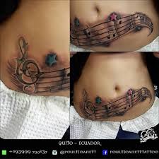 Star tattoos are the symbol of guiding people in life. Music And Star Tattoo On Stomach Blurmark