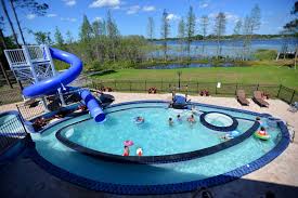 pool with lazy river and waterslide at