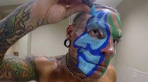 jeff hardy applying his face paint