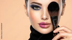 cosmetic brush at face woman covering
