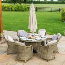 Parasols with coloured bases, hanging chairs and swing seats. Garden Furniture House Garden Furniture Shops