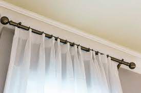 how to put up a curtain pole window