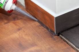 gap between baseboard and tile floor