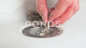 remove hair from the shower drain