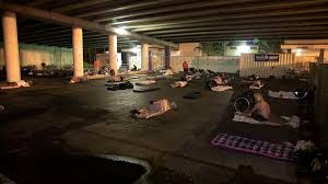 homeless shelter moves mattresses to