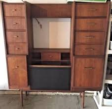 A secretary desk or escritoire is made of a base of wide drawers topped by a desk with a hinged desktop surface, which is in turn topped by a bookcase usually closed with a pair of doors, often made of glass. Danish Mid Century Modern Tall Walnut Secretary Desk Richardson Nemschoff Ebay