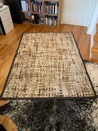 woven cow hide rug with calico backing