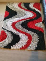 wave pattern gy fluffy area rug