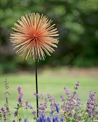 Whether you're looking to modernize your whether you've got an obscure collection of old bottle caps or are just looking for a fun, relatively easy diy yard art craft, making metal flowers is a great choice. Flower Garden Stakes Metal Vtwctr