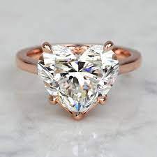 custom 5 carat heart diamond enement ring with heart setting detail