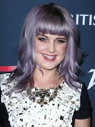 Kelly osbourne pixie haircut the incorporation of medium to long layers cut throughout the back and sides of the hair can balance out the body towing to the curls. Beauty News Kelly Osbourne S Purple Eyes And Powerful Lips