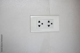 double plug socket of thailand on wall