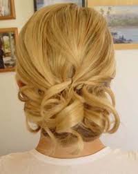 Neat waves are created with the help of a flat iron and are kept intact by hairspray. Wedding Hairstyle Vintage Wedding Hairstyles Classic Wedding Hair Updos Hair Styles Classic Wedding Hair Short Hair Updo