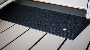 Maybe extend beyond the trim a 1/4 at most? Threshold Ramps Door Threshold Entry Ramps Mats And Plates Threshold Cover Rubber Wheelchair Ramp Tresholds Door Threshold Plate