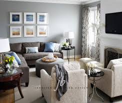 The living room is divided into two separate areas, but the transitional furniture and style across the whole space helps them blend together seamlessly. Another Sectional Layout Sectional Sofa Layout Sofa Layout Livingroom Layout