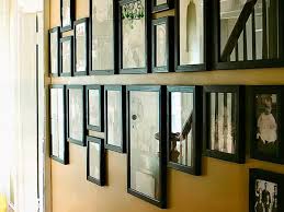 how to display framed photos on a wall