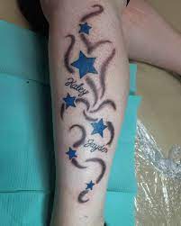 A stream of stars, some big some small looks like a shining galaxy where it's raining stars. 145 Star Tattoo Designs To Infinity And Beyond