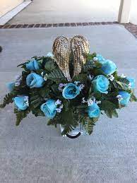 Pay respects with this cemetery vase. Small Cemetery Saddle Angel Wings Baby Child Small Headstone Cemetery Flowers Blue Roses Arrangement Gr Cemetery Flowers Grave Decorations Cemetary Decorations