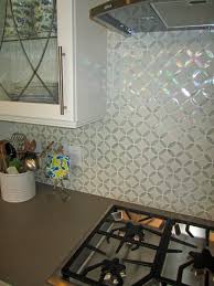 One of our customers puts the finishing touches on her shower mosaic. Mosaic Backsplashes Pictures Ideas Tips From Hgtv Home Depot Backsplash Trendy Kitchen Backsplash Glass Tiles Kitchen