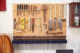 woodworking tools hanging on the wall