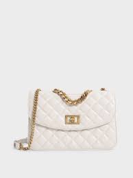 ivory quilted chain bag charles