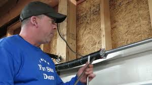 garage door torsion spring repair