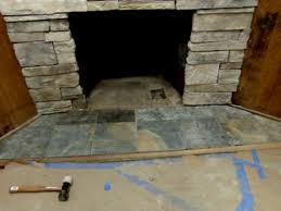 cover a brick fireplace with stone