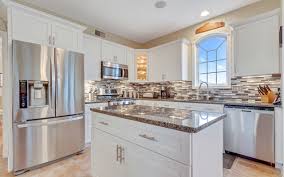 The average cost to reface kitchen cabinets depend on a myriad of factors. National Refacing Systems