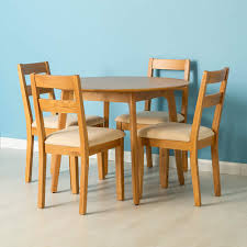 For sale a round dining table with four chairs. Nordic Solid Oak Small Round Dining Table Set 4 Chairs Light Oak Roseland Furniture