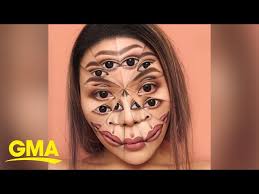 artist creates makeup illusions