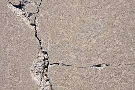 Solved! What to Do About Cracks in a Concrete Driveway - Bob Vila